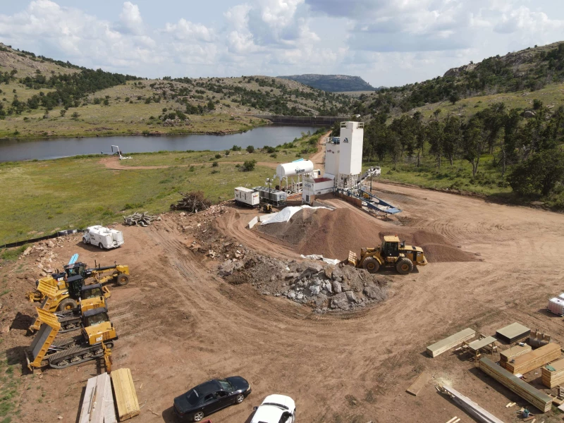 Photo was taken of SEMA’s RCC Plant and yard Facility used for the construction of the New RCC Dam Face.  This project consisted of lowering the lake, excavation of the down stream toe of the dam and installation of a new toe buttress and new 10 wide doweled face, constructed from High Slump RCC