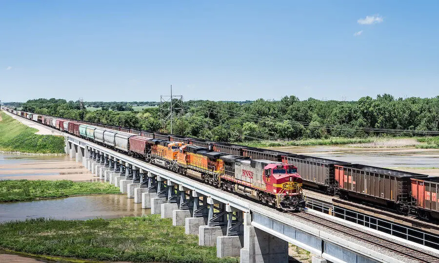 photo of a train on a bridge